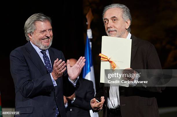 Spanish director Fernando Trueba receives from Spanish culture minister Inigo Mendez de Vigo the Cinematography Award 2015 at the San Telmo museum...