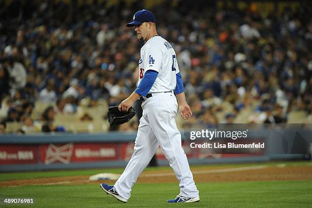 Paul Maholm of the Los Angeles Dodgers leaves the game in the sixth inning against the San Francisco Giants at Dodger Stadium on May 9, 2014 in Los...