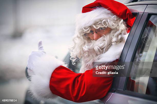 driving santa. - santa clause stockfoto's en -beelden