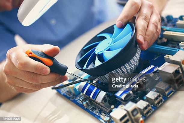 computer repair. - electric fan stock pictures, royalty-free photos & images