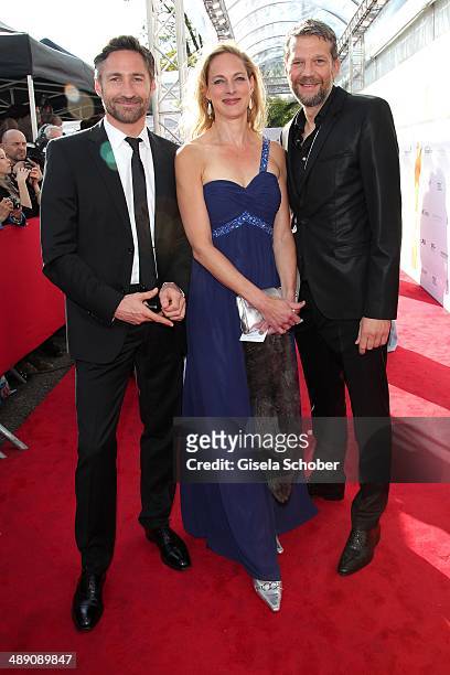 Benjamin Sadler, Sophie von Kessel and Kai Wiesinger attend the Lola - German Film Award 2014 at Tempodrom on May 9, 2014 in Berlin, Germany.