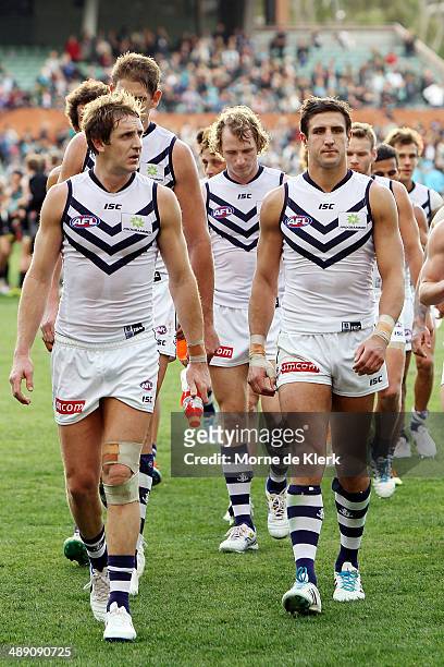 Dockers players leave the field lead by their captain Matthew Pavlich after the round eight AFL match between the Port Adelaide Power and Fremantle...
