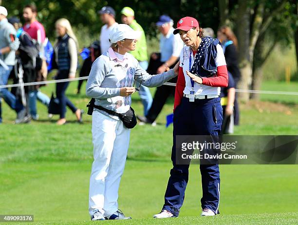 Annika Sorenstam of Sweden one of the European Team vice captains speaking animatedly with Juli Inkster the United States team captain on the 18th...