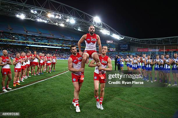 Rhyce Shaw of the Swans is chaired from the ground after his last AFL match during the First AFL Semi Final match between the Sydney Swans and the...