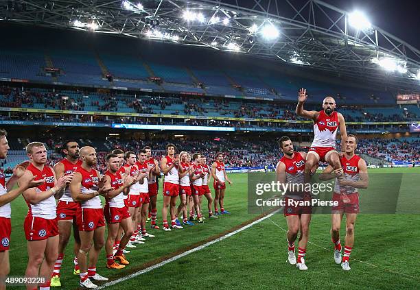 Rhyce Shaw of the Swans is chaired from the ground after his last AFL match during the First AFL Semi Final match between the Sydney Swans and the...