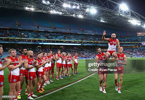 Rhyce Shaw of the Swans is chaired from the ground after his last AFL match during the First AFL Semi Final match between the Sydney Swans and the...