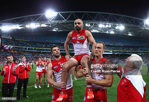 Rhyce Shaw of the Swans is chaired from the ground after his last AFL match during the First AFL Semi Final match between the Sydney Swans and the...