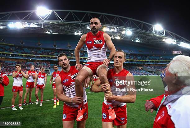 Rhyce Shaw of the Swans is chaired from the ground after his last AFL match during the First AFL Semi Final match between the Sydney Swans and the...