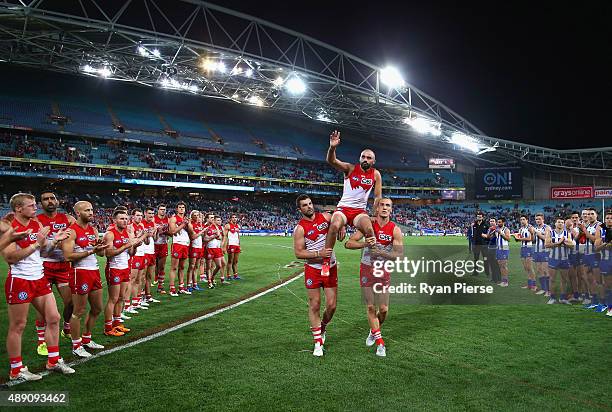 Rhyce Shaw of the Swans is chaired from the ground after his last AFL match during the First AFL Semi Final match between the Sydney Swans and the...