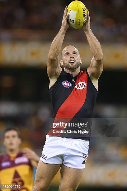 Paul Chapman of the Bombers takes a mark during the round eight AFL match between the Brisbane Lions and the Essendon Bombers at The Gabba on May 10,...