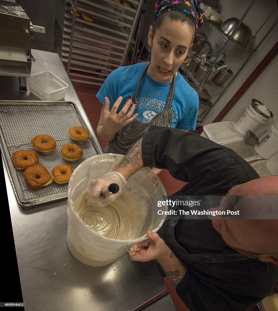 Astro Donuts prepares their confections for the upcoming Sweetlife music festival in Washington, DC.