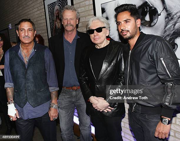 Nur Khan, owner of Morrison Hotel Gallery Peter Blachley, musician and photographer Chris Stein, and guest attend the "Blondie 4 Ever" Exhibition...