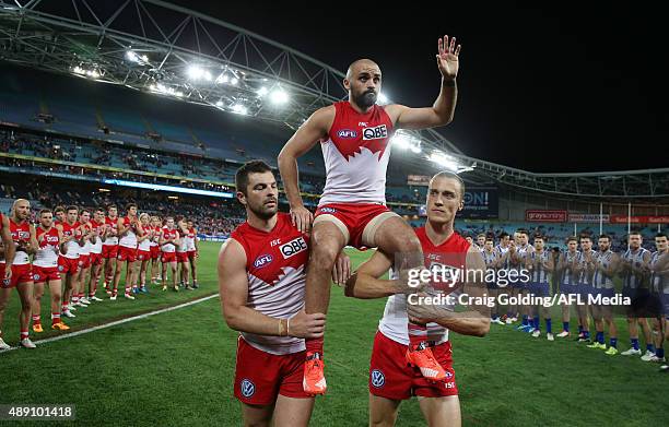 Rhyce Shaw of the Swans is chaired off after the 2015 AFL First Semi Final match between the Sydney Swans and the North Melbourne Kangaroos at ANZ...