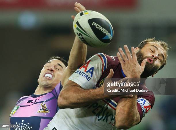 Brett Stewart of the Eagles and Billy Slater of the Storm contest for the ball during the round nine NRL match between the Melbourne Storm and the...