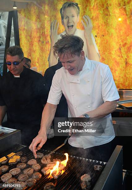 Television personality and chef Gordon Ramsay cooks at his Gordon Ramsay BurGR booth at Vegas Uncork'd by Bon Appetit's Grand Tasting event at...