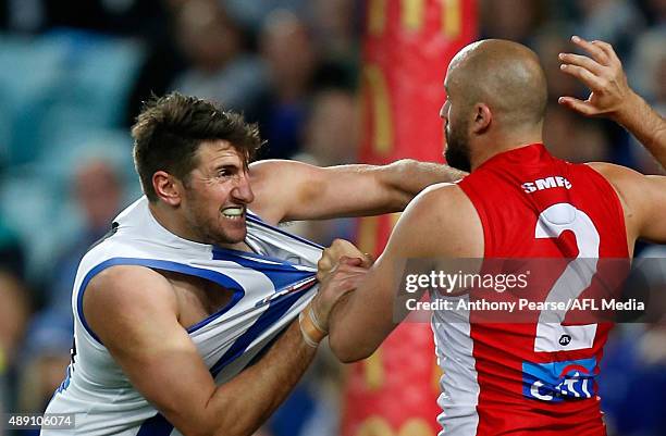 Jarrad Waite of the Roos and Rhyce Shaw of the Swans compete during the First AFL Semi Final match between the Sydney Swans and the North Melbourne...