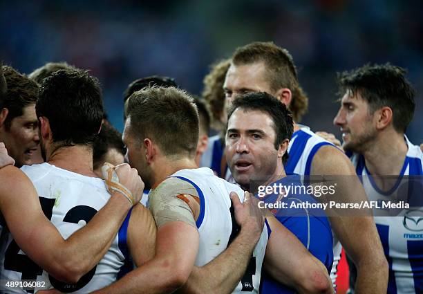 Coach Brad Scott of the Roos in action during the First AFL Semi Final match between the Sydney Swans and the North Melbourne Kangaroos at ANZ...