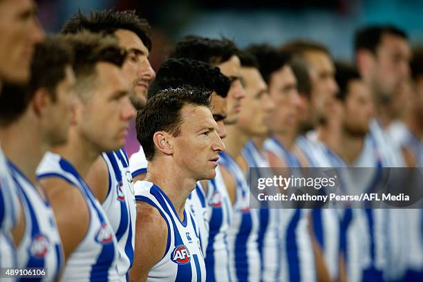 Brent Harvey of the Roos lines up for the national anthem during the First AFL Semi Final match between the Sydney Swans and the North Melbourne...