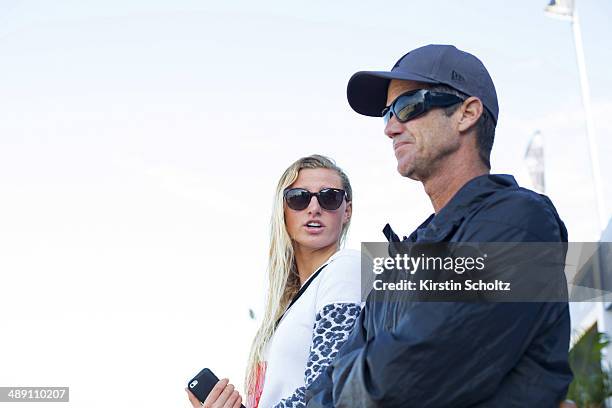 Lakey Peterson of the United States of America with her coach Mike Parsons at the Billabong Rio Pro on May 10, 2014 in Rio de Janeiro, Brazil.