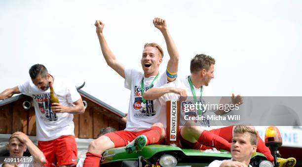 Marc Schnatterer of Heidenheim celebrates the championship title win of the Third League at Voith-Arena on May 10, 2014 in Heidenheim, Germany.