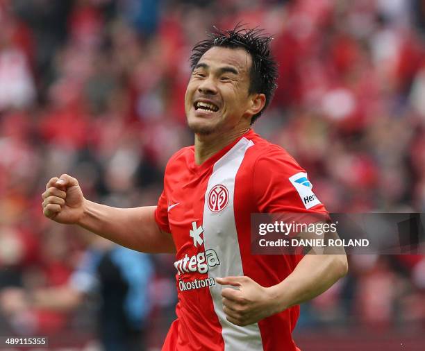 Mainz' Japanese striker Shinji Okazaki celebrates scoring the 3-1 during the German first division Bundesliga football match FSV Mainz 05 vs...