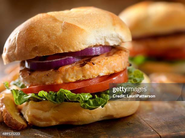 salmon burger - fish cakes stock pictures, royalty-free photos & images