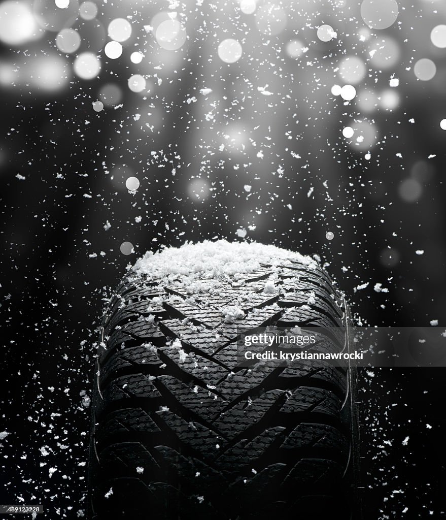 New tire during snowstorm