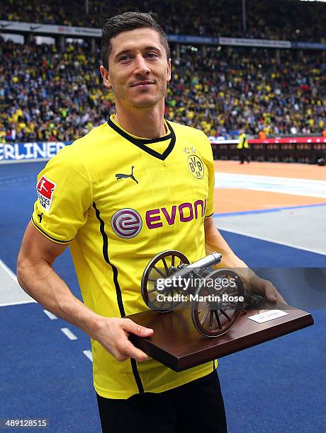Robert Lewandowski of Dortmuns celebrate after winning the Torjaegerkanone after the Bundesliga match between Hertha BSC and Borussia Dortmund at...