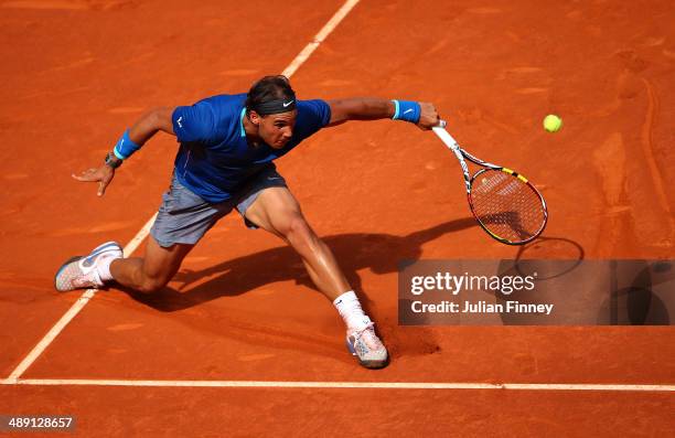Rafael Nadal of Spain in action against Roberto Bautista Agut of Spain during day eight of the Mutua Madrid Open tennis tournament at the Caja Magica...