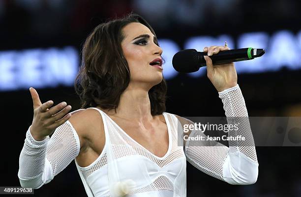 Singer Laura Wright performs during the opening ceremony of the Rugby World Cup 2015 match between England v Fiji at Twickenham Stadium on September...