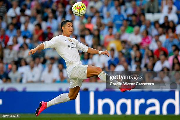 Cristiano Ronaldo of Real Madrid controls the ball during the La Liga match between Real Madrid CF and Granada CF at Estadio Santiago Bernabeu on...