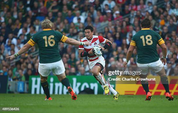 Ayumu Goromaru of Japan attacks the South African defence during the 2015 Rugby World Cup Pool B match between South Africa and Japan at the Brighton...