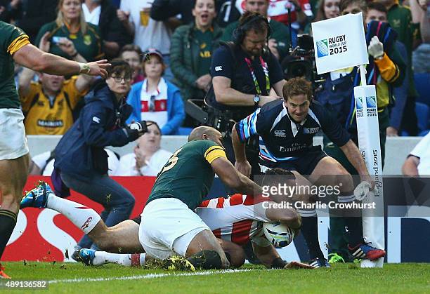 Karne Hesketh of Japan scores the winning try during the 2015 Rugby World Cup Pool B match between South Africa and Japan at the Brighton Community...