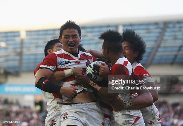 Ayumu Goromaru of Japan celebrates scoring the second try for Japan during the 2015 Rugby World Cup Pool B match between South Africa and Japan at...
