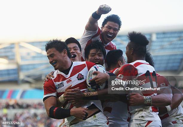 Ayumu Goromaru of Japan ceelbrates scoring the second try during the 2015 Rugby World Cup Pool B match between South Africa and Japan at the Brighton...