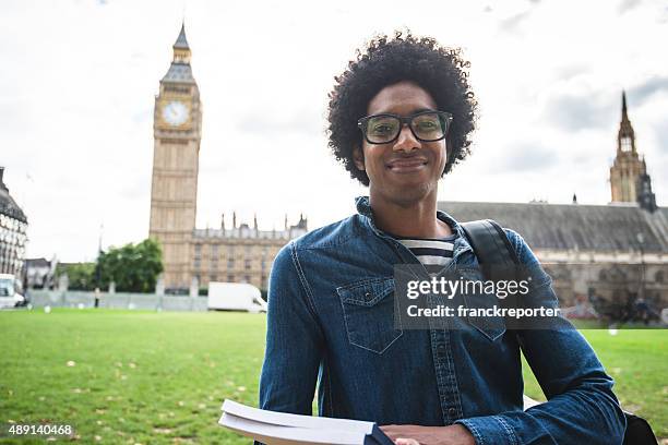 student in london - big ben black and white stock-fotos und bilder