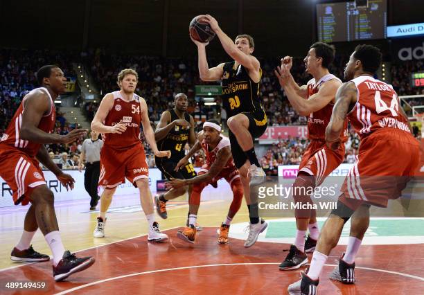 Michael Stockton of Ludwigsburg is surrounded by five opponents while trying to score during game one of the 2014 Beko BBL Playoffs semifinals...