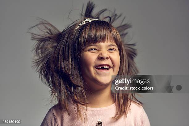 missing tooth happiness - portrait of a young girl with gappy teeth and blond hair stock pictures, royalty-free photos & images