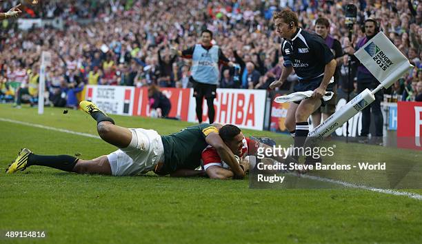 Karne Hesketh of Japan scores the winning try during the 2015 Rugby World Cup Pool B match between South Africa and Japan at Brighton Community...