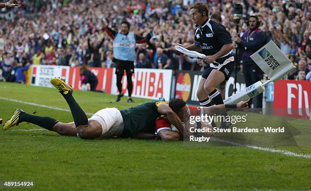 Karne Hesketh of Japan scores the winning try during the 2015 Rugby World Cup Pool B match between South Africa and Japan at Brighton Community...