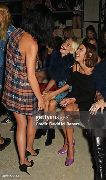 Leigh Lezark, Poppy Delevingne and Alexa Chung attend the House Of Holland show during London Fashion Week SS16 at Collins Music Hall on September...