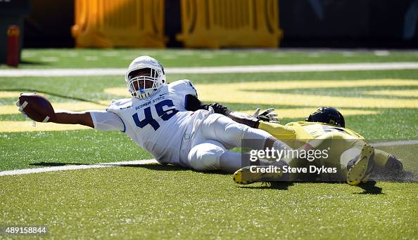 Tight end Keith Rucker of the Georgia State Panthers is brought down ...