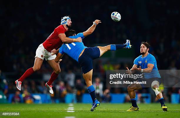 Alexandre Dumoulin of France, Giovanbattista Venditti of Italy and Andrea Masi of Italy challenge for the high ball during the 2015 Rugby World Cup...