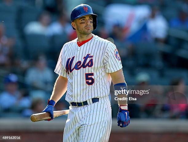 David Wright of the New York Mets walks back to the dugout after striking out in the ninth inning against the New York Yankees during interleague...
