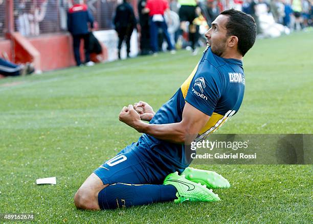 Carlos Tevez of Boca Juniors celebrates after scoring the first goal of his team during a match between Argentinos Juniors and Boca Juniors as part...