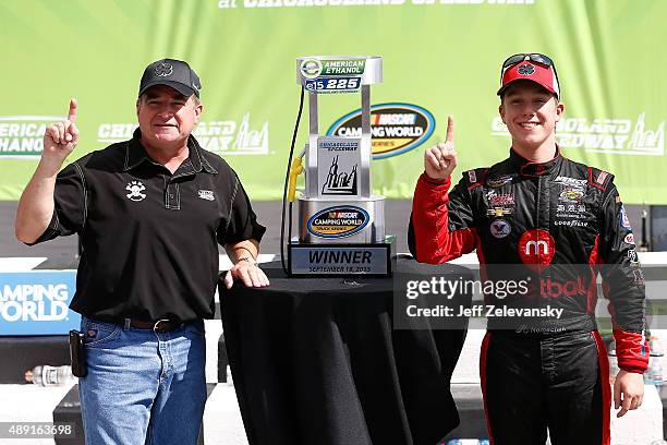 Joe Nemechek , and John Hunter Nemechek, driver of the Chevrolet, celebrate in Victory Lane after winning the NASCAR Camping World Truck Series...
