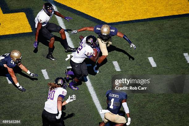 Chris Hairston of the East Carolina Pirates carries the ball against the Navy Midshipmen in the first half on September 19, 2015 in Annapolis,...