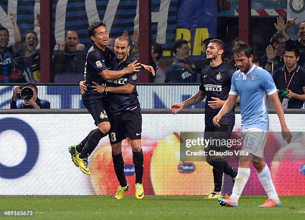 Rodrigo Palacio of FC Inter Milan celebrates his goal with team-mate Yuto Nagatomo during the Serie A match between FC Internazionale Milano and SS...