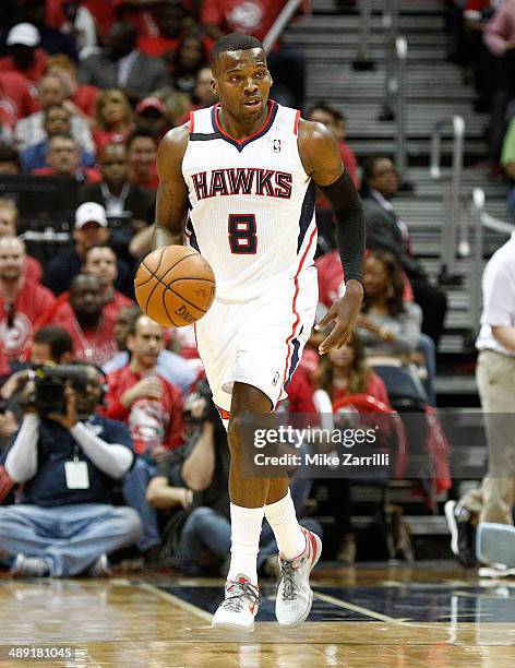 Guard Shelvin Mack of the Atlanta Hawks dribbles in Game Six of the Eastern Conference Quarterfinals against the Indiana Pacers during the 2014 NBA...