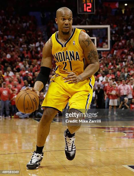 Forward David West of the Indiana Pacers dribbles in Game Six of the Eastern Conference Quarterfinals against the Atlanta Hawks during the 2014 NBA...